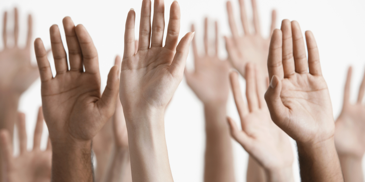Shutterstock raised hands
